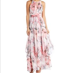 Pink floral gown. Halter neckline with keyhole. Hidden back zip. New with tags.